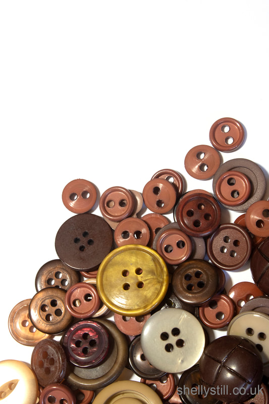 Collection of Sewing Craft Buttons Stock Photo Brown Shelly Still